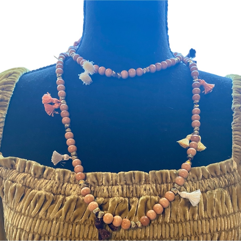 Hipchik Couture beaded necklace with tassels. Light tan color beads. Brand new!